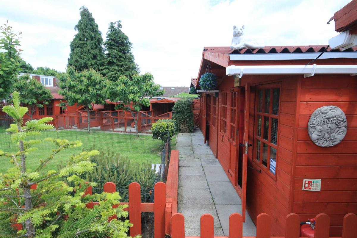 Row of red boarding cabins at Redbeck